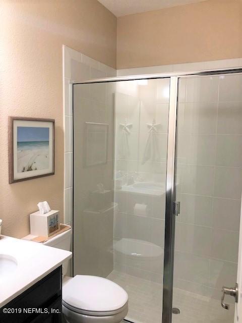 188 Antilles Road St. Augustine, FL 32092 - Photo 15 of 43 a white toilet sitting next to a bathroom sink