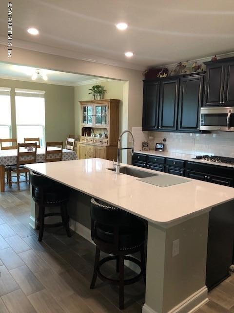 188 Antilles Road St. Augustine, FL 32092 - Photo 2 of 43 a kitchen with a sink and cabinets