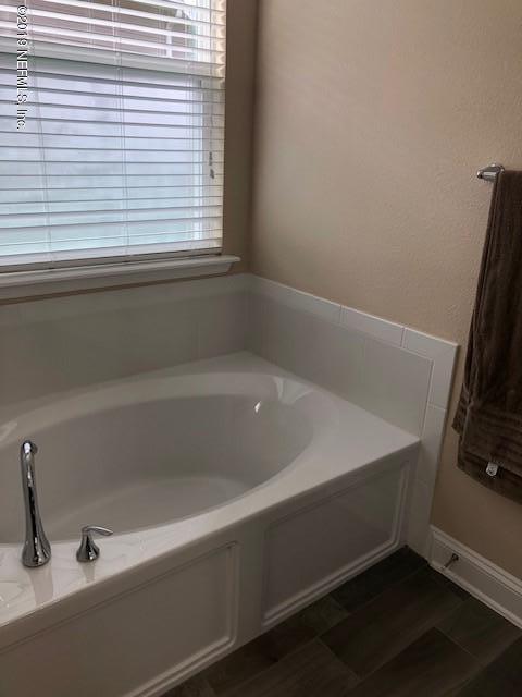 188 Antilles Road St. Augustine, FL 32092 - Photo 28 of 43 a bath tub sitting next to a window