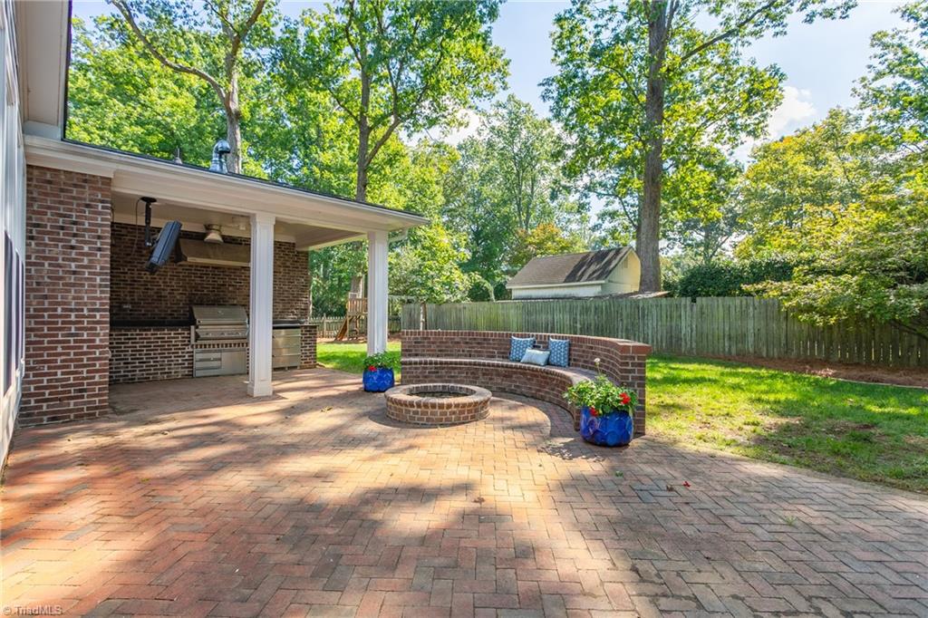 1607 Beechtree Road Greensboro, NC 27408 - Photo 40 of 47 Outdoor patio and fire pit