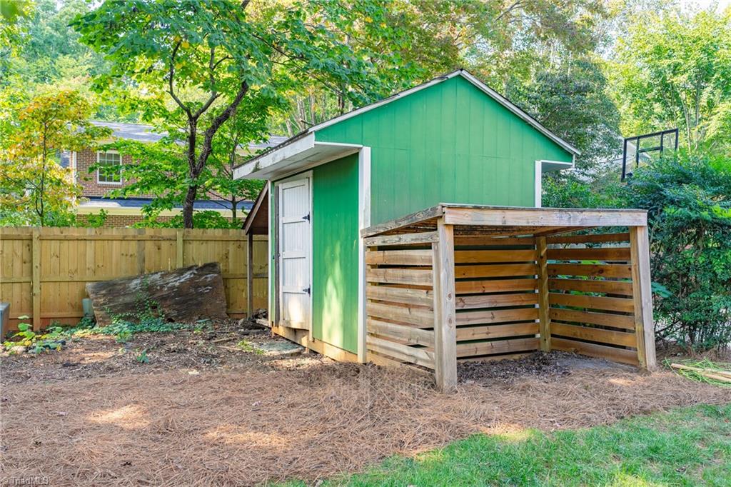 1607 Beechtree Road Greensboro, NC 27408 - Photo 44 of 47 Storage building in backyard