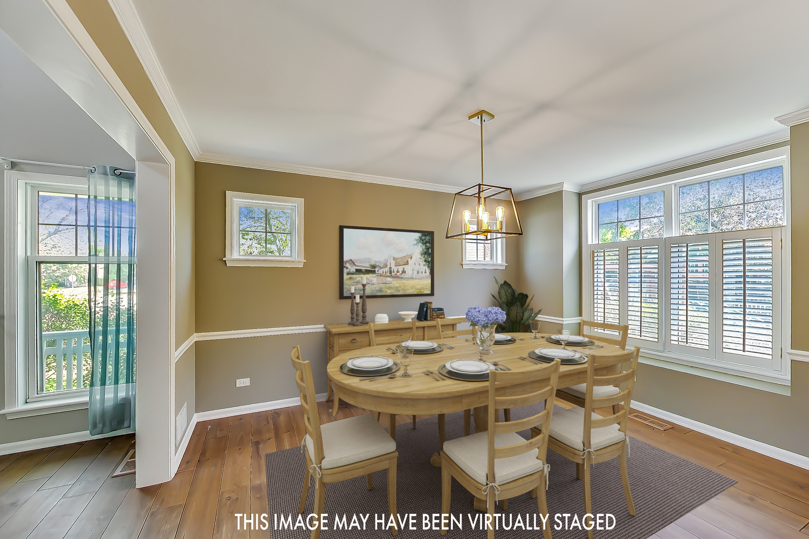 2524 High Meadow Road Naperville, IL 60564 - Photo 7 of 31 a view of a dining room with furniture wooden floor and chandelier