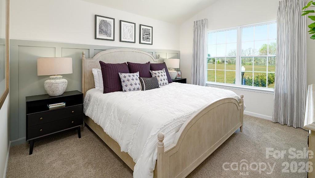 3281 Ora Smith Road Lincolnton, NC 28092 - Photo 13 of 30 a spacious bedroom with a bed and window