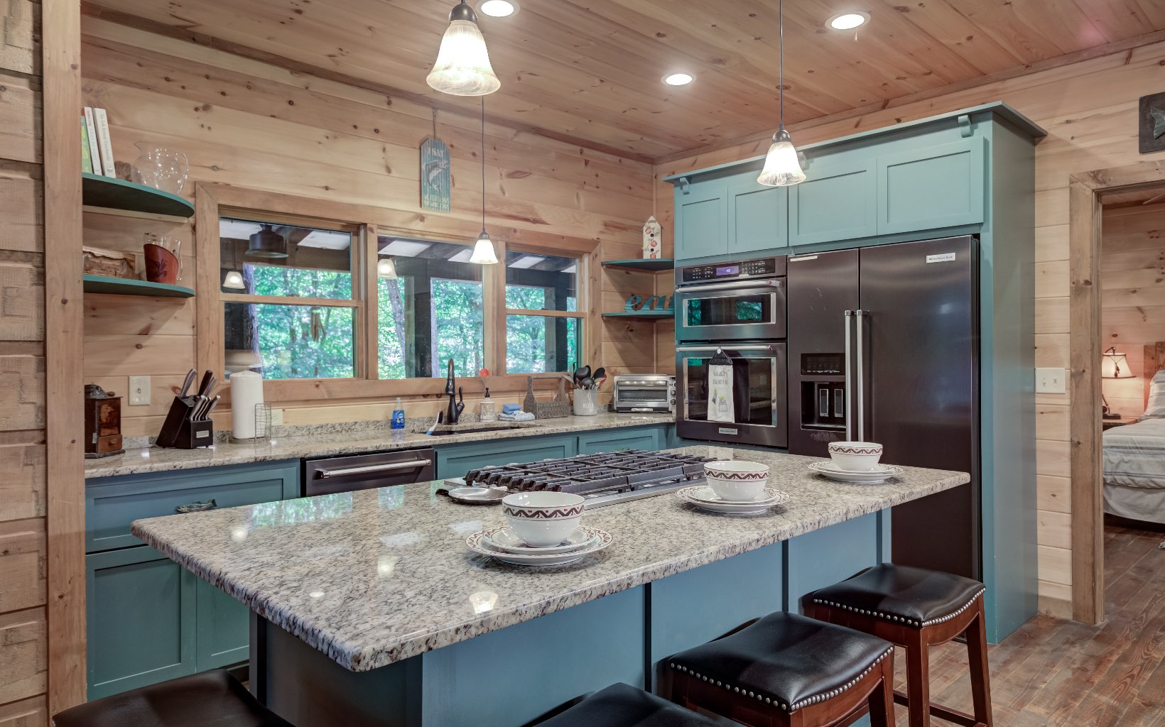 15 Kiki's River Road Blue Ridge, GA 30513 - Photo 18 of 32 a kitchen with sink and refrigerator