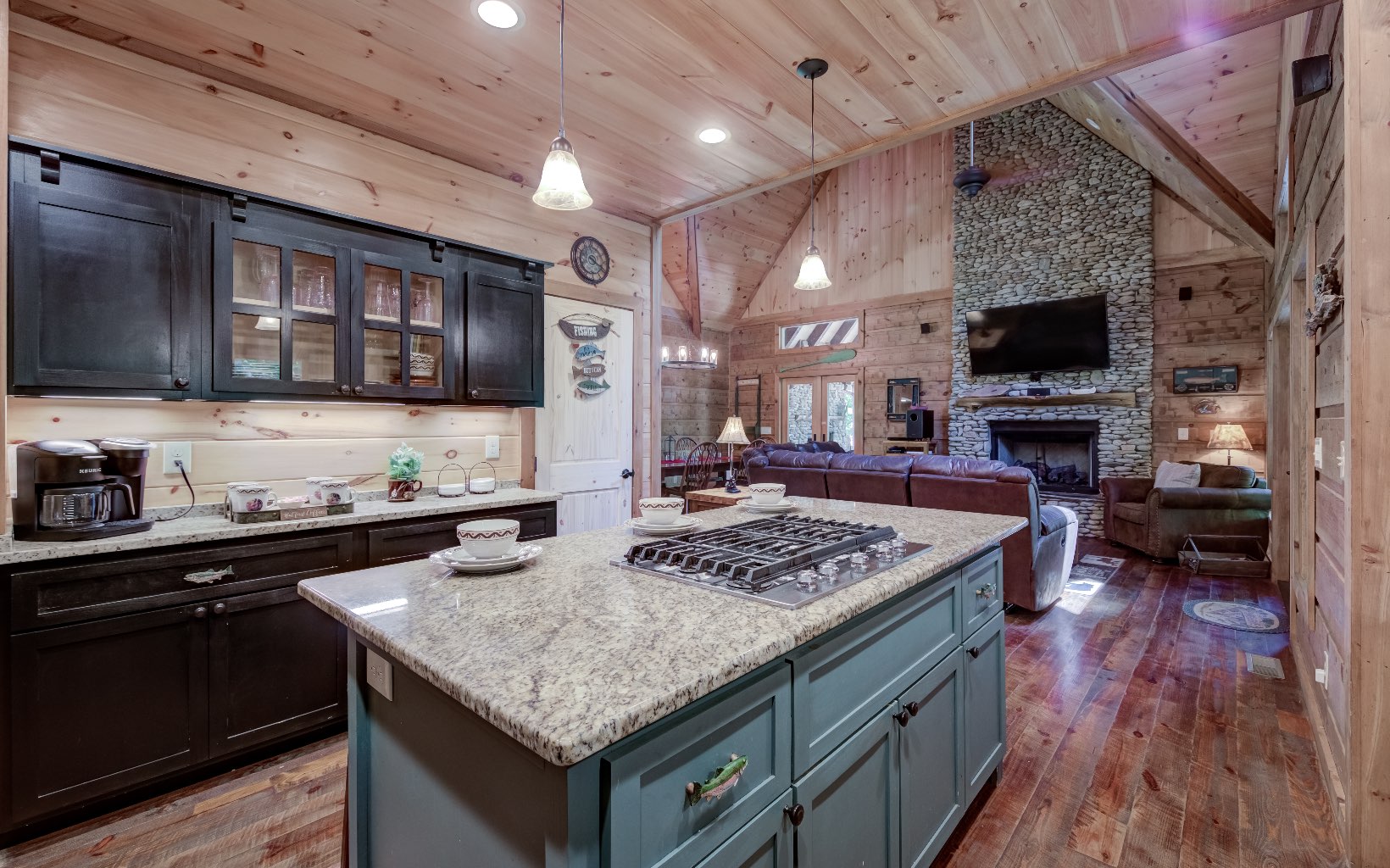 15 Kiki's River Road Blue Ridge, GA 30513 - Photo 19 of 32 a kitchen with stainless steel appliances granite countertop a stove sink and cabinets