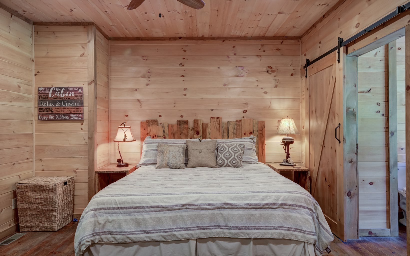 15 Kiki's River Road Blue Ridge, GA 30513 - Photo 22 of 32 a bedroom with a bed and wooden floor