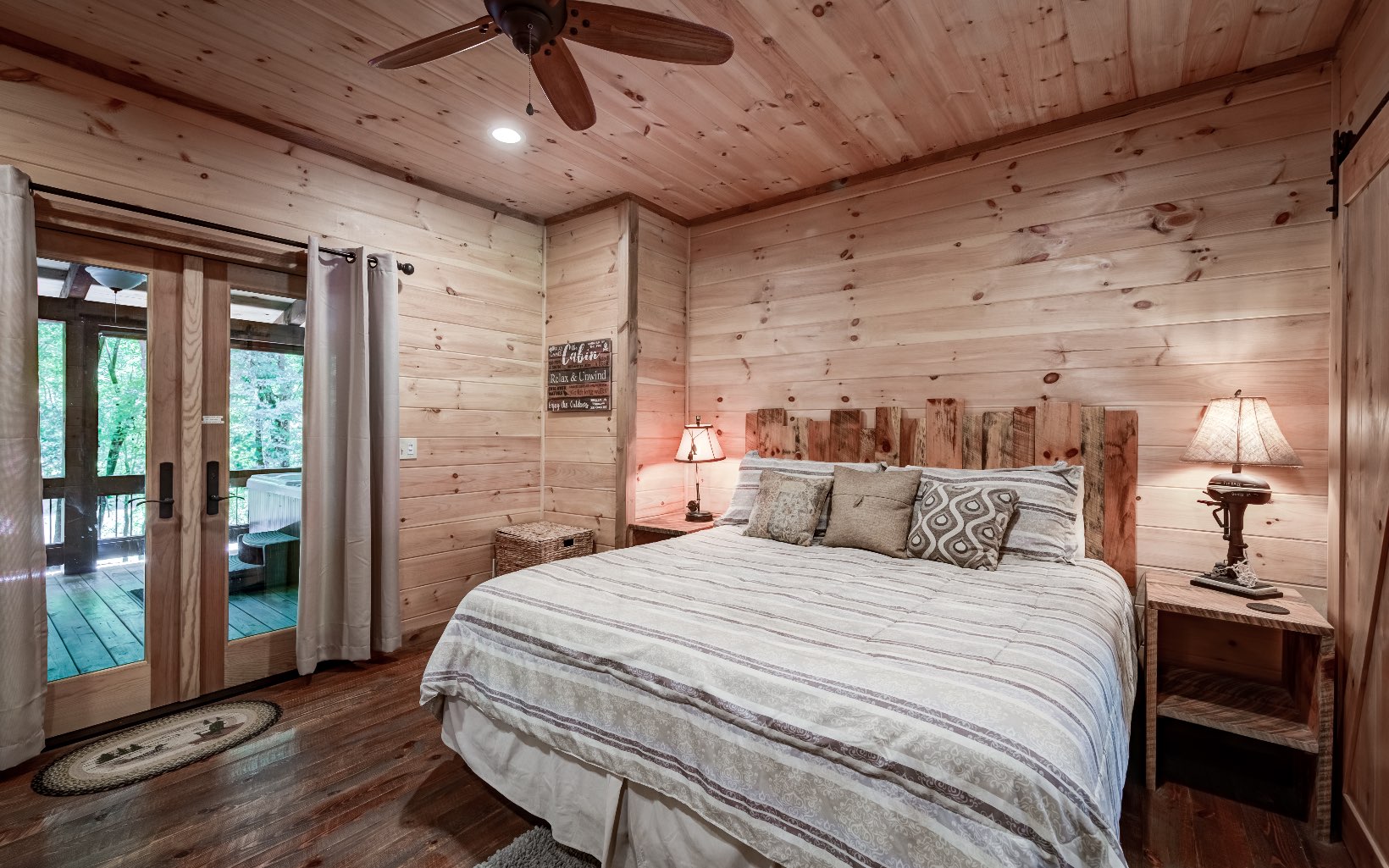 15 Kiki's River Road Blue Ridge, GA 30513 - Photo 23 of 32 a bedroom with a bed and a large window