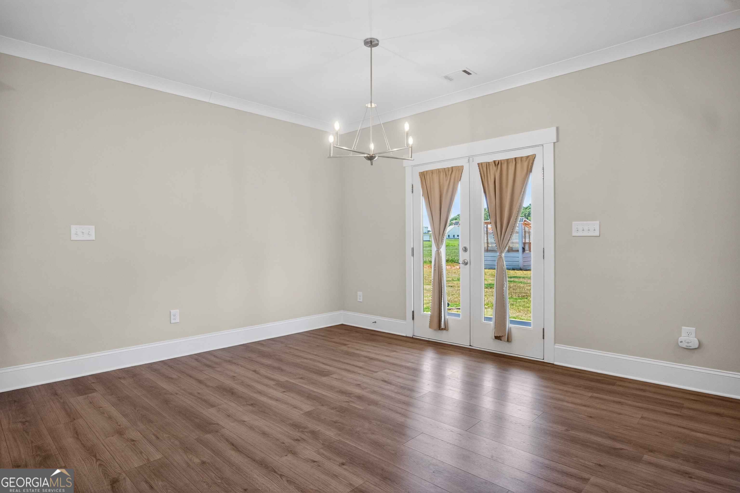 1350-c O Draper Road Comer, GA 30629 - Photo 32 of 47 wooden floor in an empty room with a window