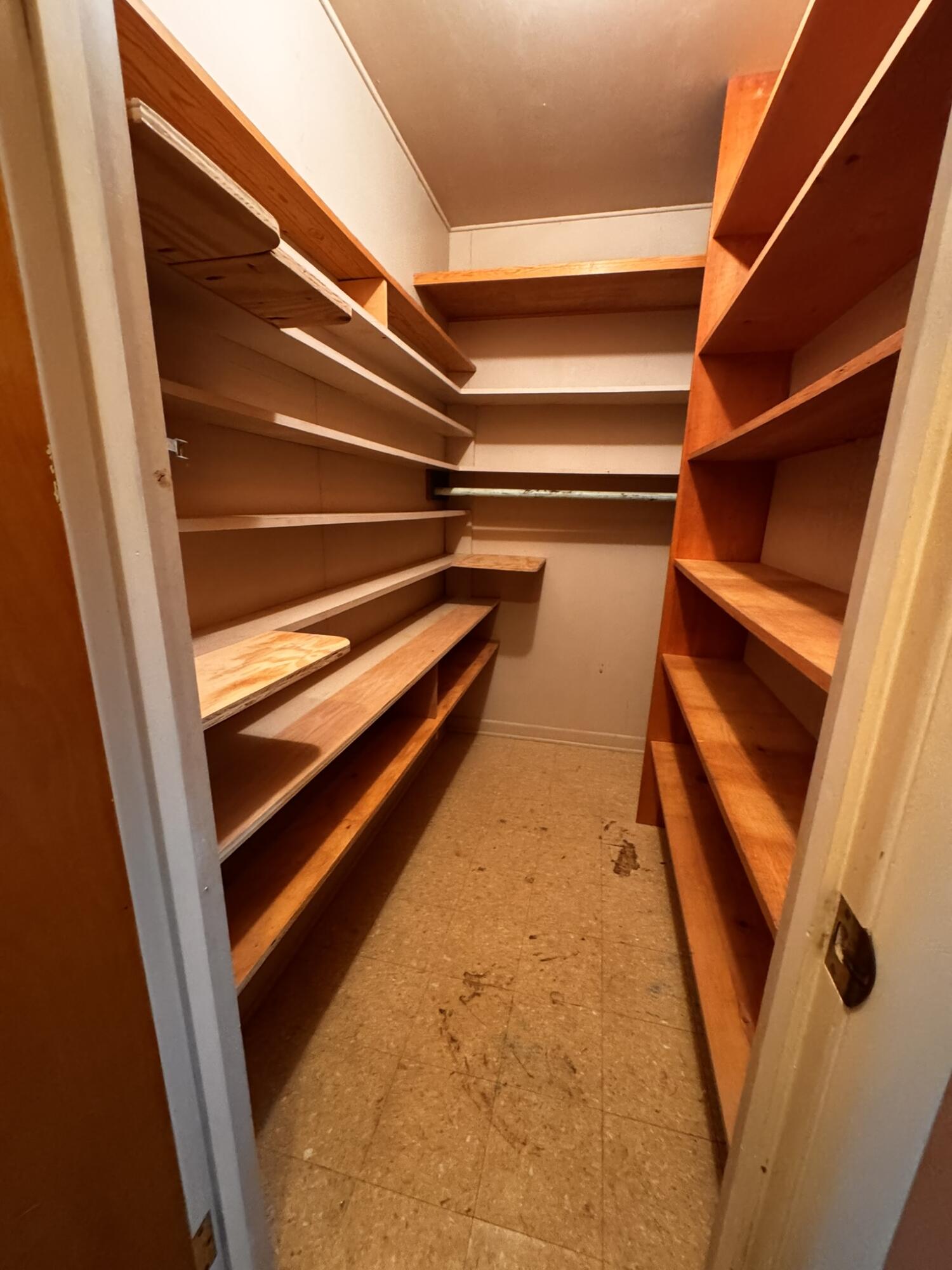 701 Zephyr Plainview, TX 79072 - Photo 16 of 29 a view of an empty room with wooden floor