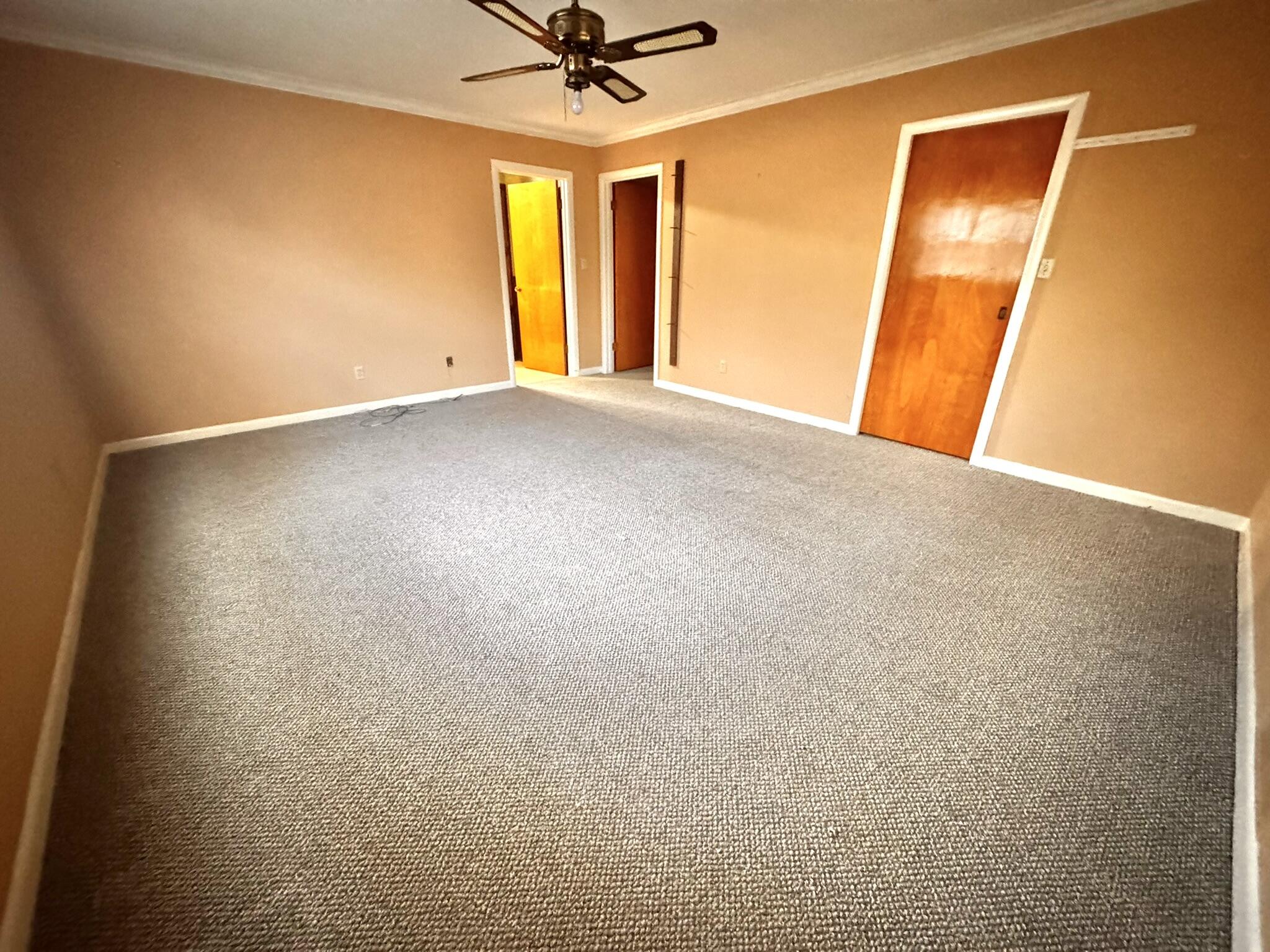 701 Zephyr Plainview, TX 79072 - Photo 18 of 29 a view of an empty room with a window