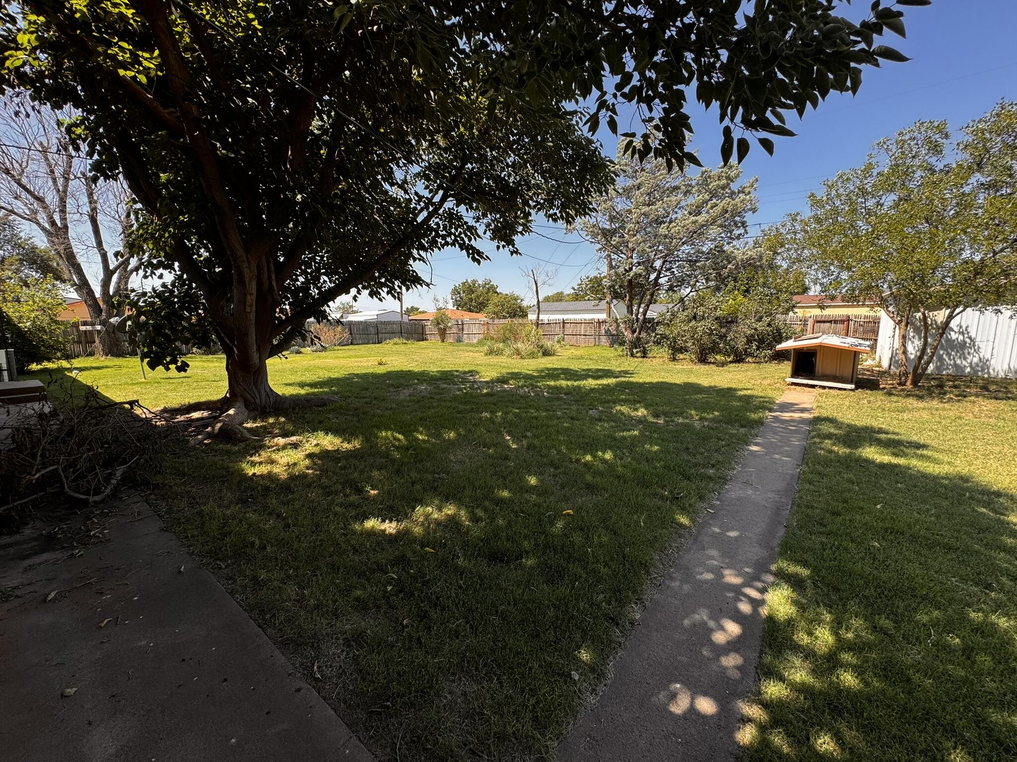 701 Zephyr Plainview, TX 79072 - Photo 27 of 29 a view of a yard with swimming pool
