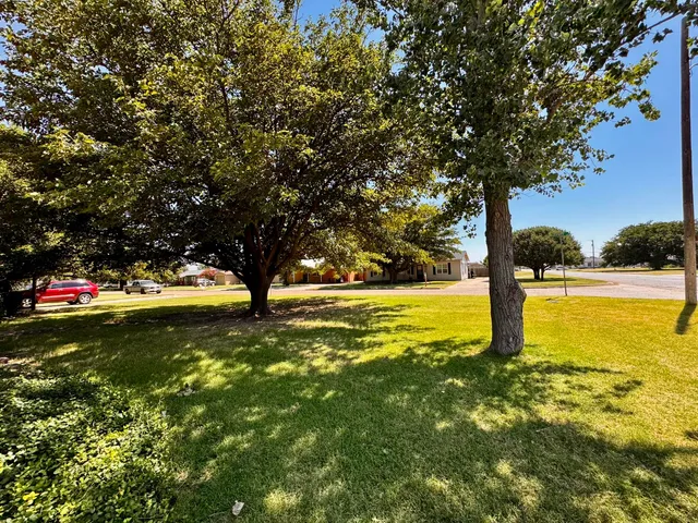 a view of a swimming pool with an outdoor space