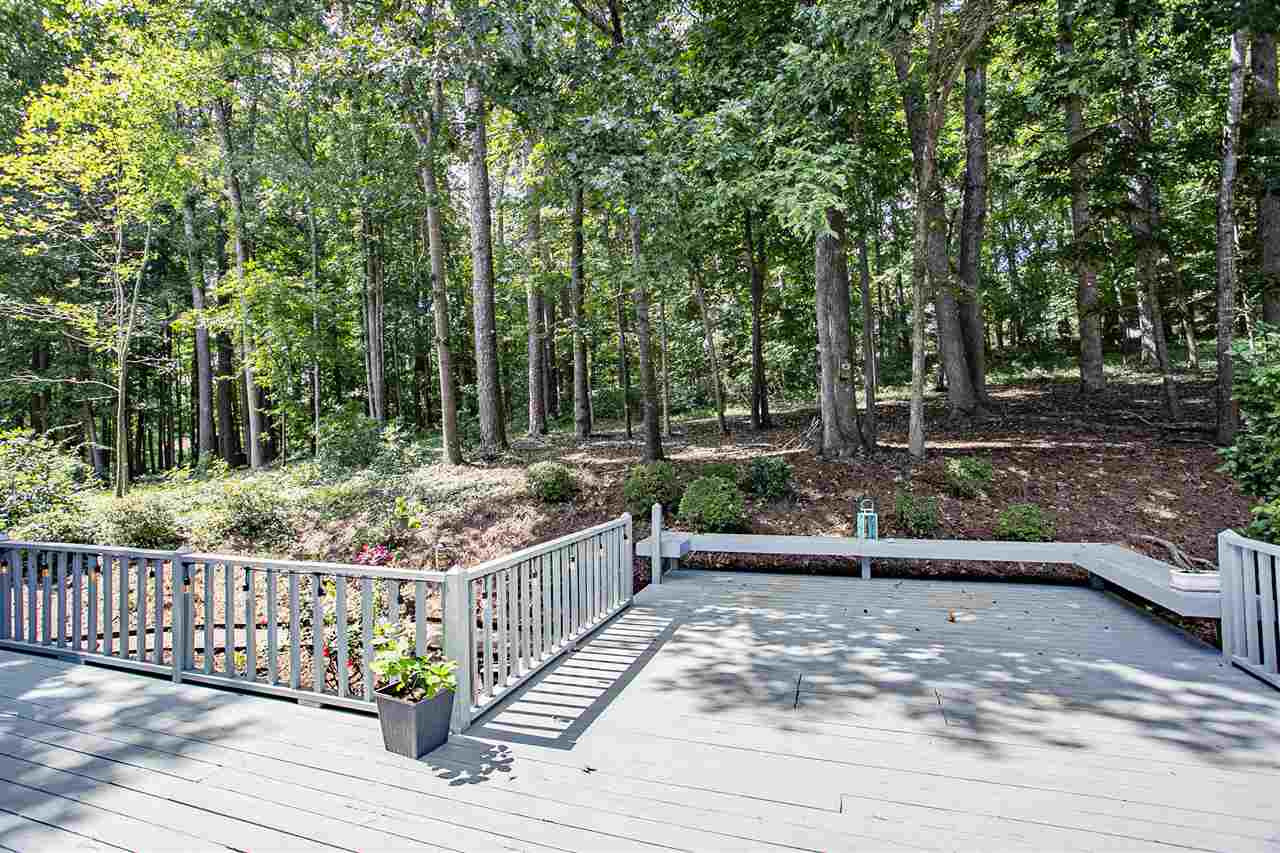 11503 South Lowell Road Bahama, NC 27503 - Photo 23 of 30 Lovely wooded backyard for playing, exploring or relaxing in the hammock. Beyond the Deck