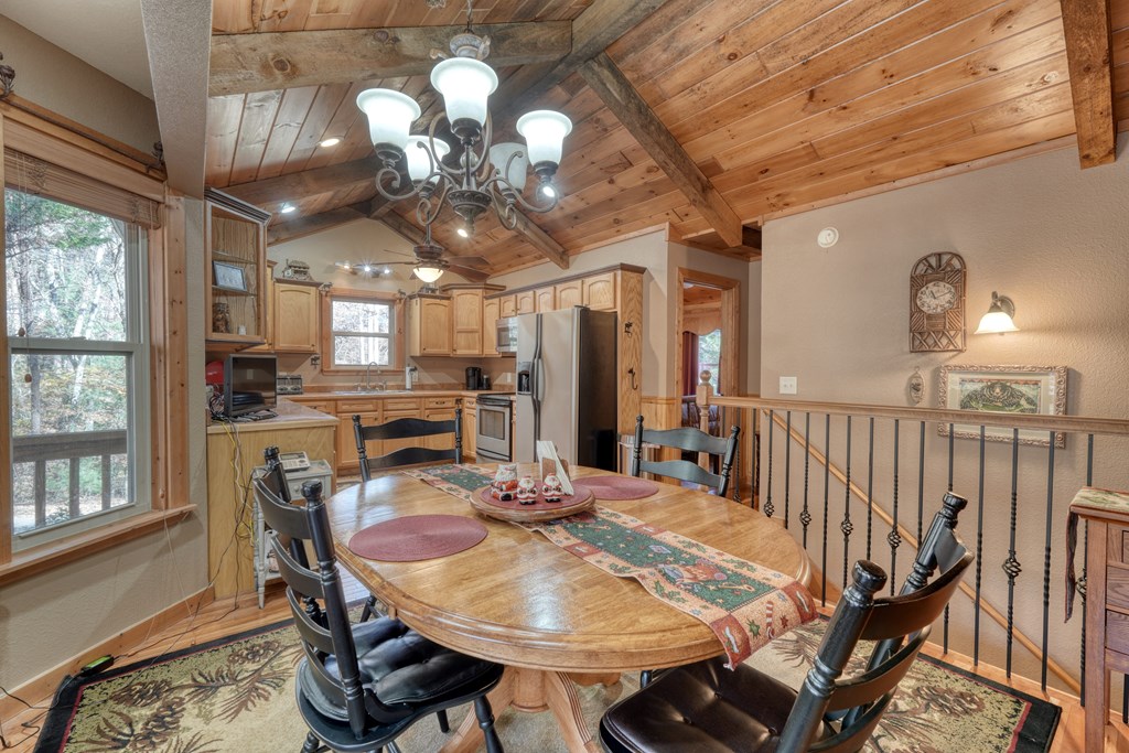 518 Rizzitello Lane Blairsville, GA 30512 - Photo 12 of 44 a view of a dining room with furniture