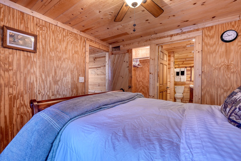 518 Rizzitello Lane Blairsville, GA 30512 - Photo 28 of 44 a bed sitting in a spacious bedroom next to a window