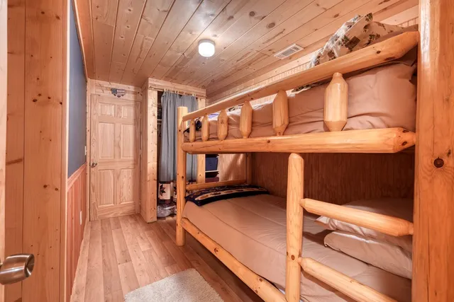 a view of a patio with a table and chairs