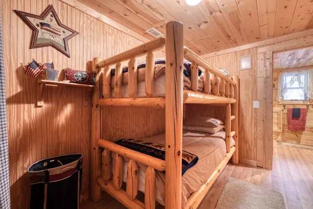 a view of a porch with wooden floor