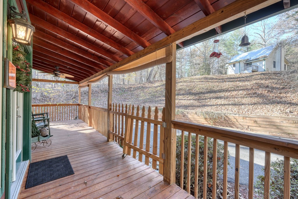 518 Rizzitello Lane Blairsville, GA 30512 - Photo 35 of 44 a view of a porch with wooden floor