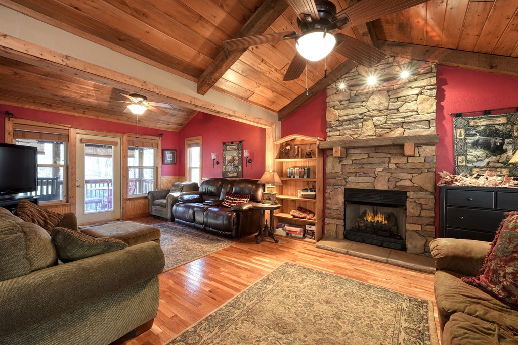 518 Rizzitello Lane Blairsville, GA 30512 - Photo 6 of 44 a living room with furniture and a fireplace