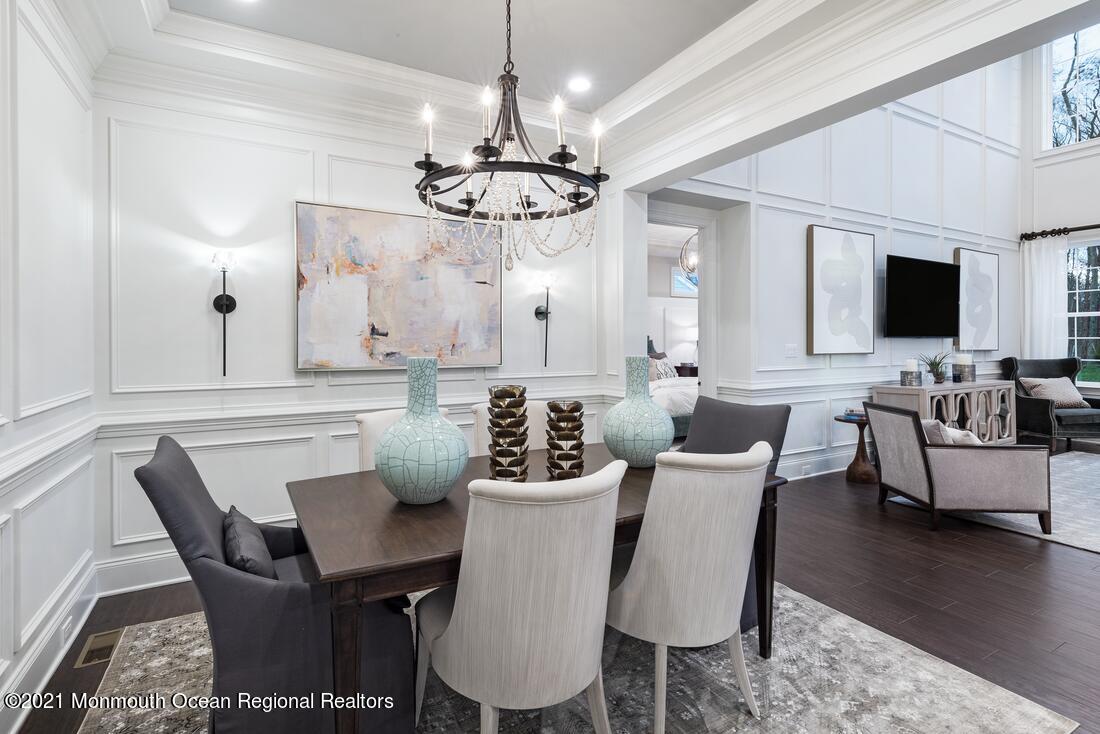 5 Old Eagle Road Freehold, NJ 07728 - Photo 4 of 17 a view of a dining room with furniture wooden floor and chandelier