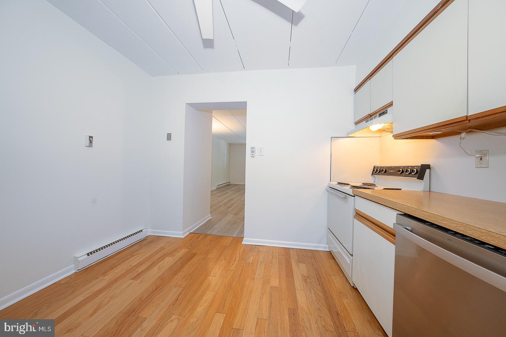 400 Glendale Road, Unit 44 Havertown, PA 19083 - Photo 19 of 29 a view of a storage & utility room with wooden floor