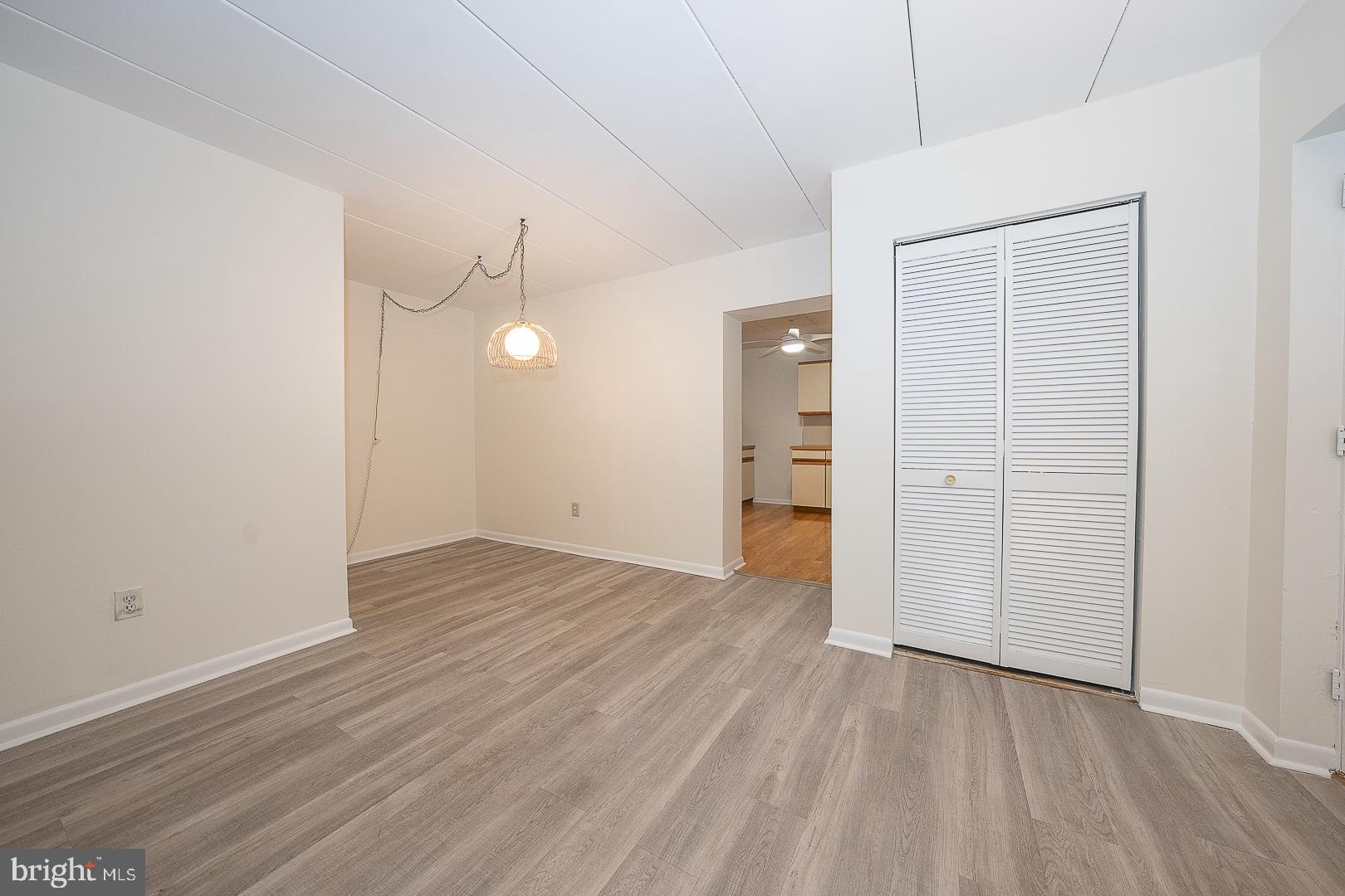 400 Glendale Road, Unit 44 Havertown, PA 19083 - Photo 8 of 29 an empty room with wooden floor and closet area