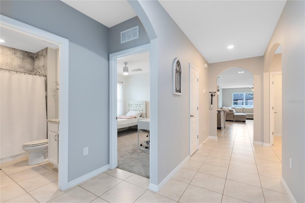1600 Spray Terrace St. Cloud, FL 34771 - Photo 13 of 30 a bathroom with a sink and a toilet
