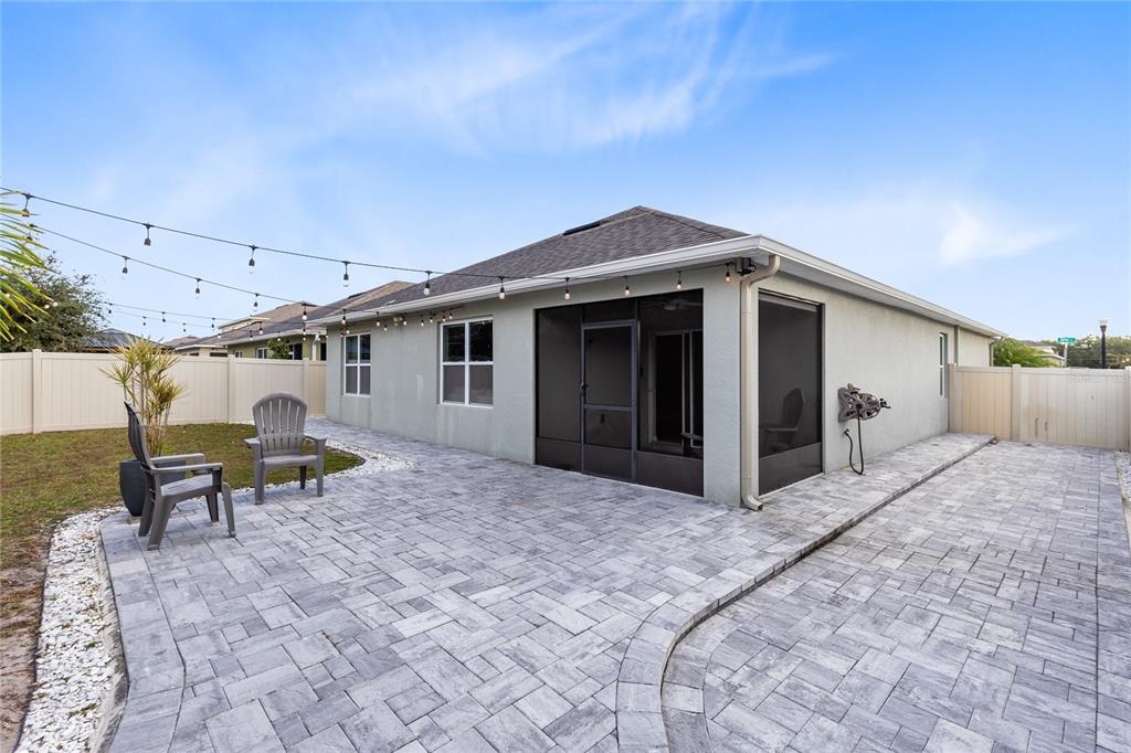 1600 Spray Terrace St. Cloud, FL 34771 - Photo 22 of 30 a front view of a house with garden