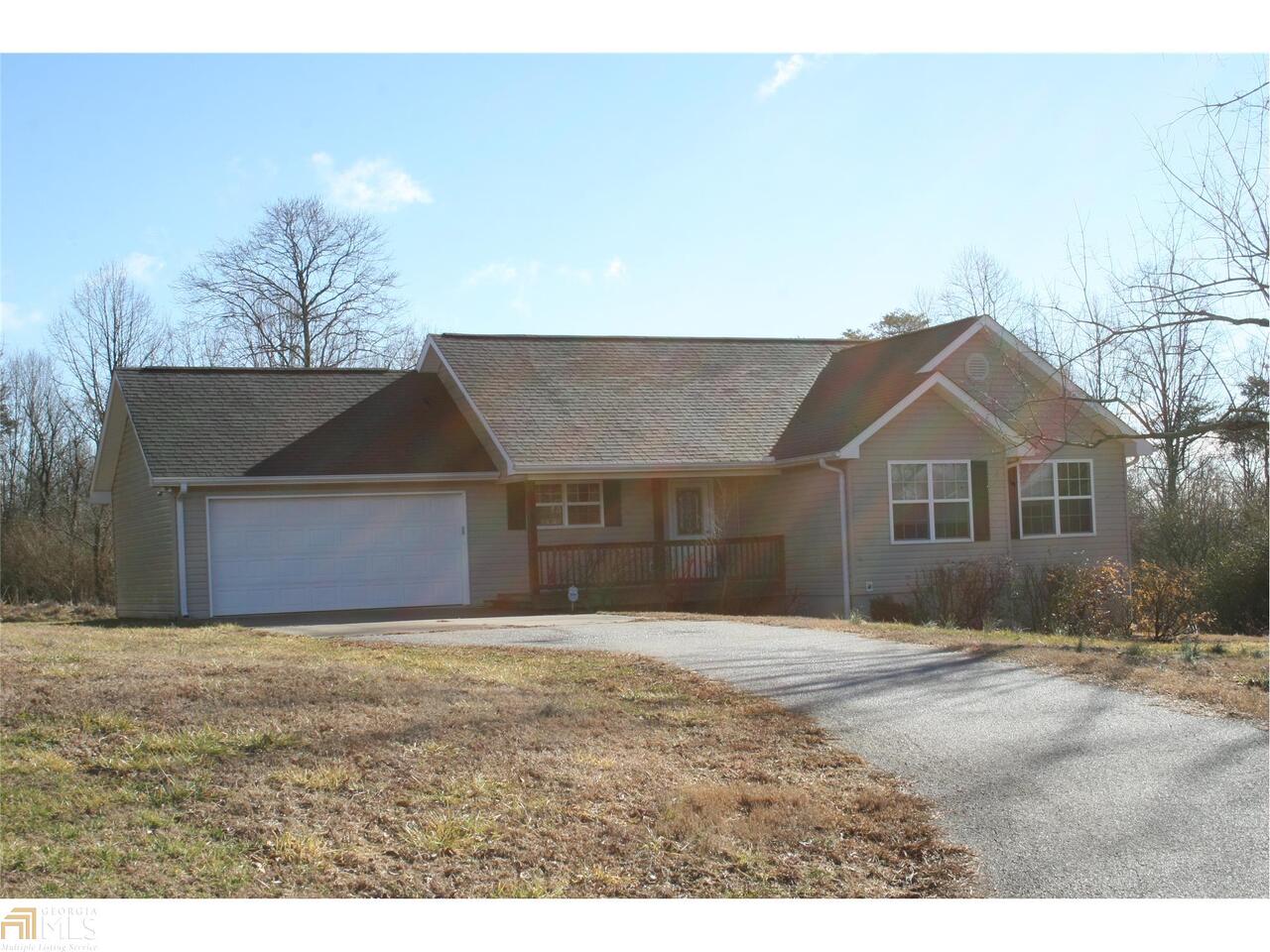 577 Holiness Campground Road Cleveland, GA 30528 - Photo 1 of 1 a front view of a house with a yard