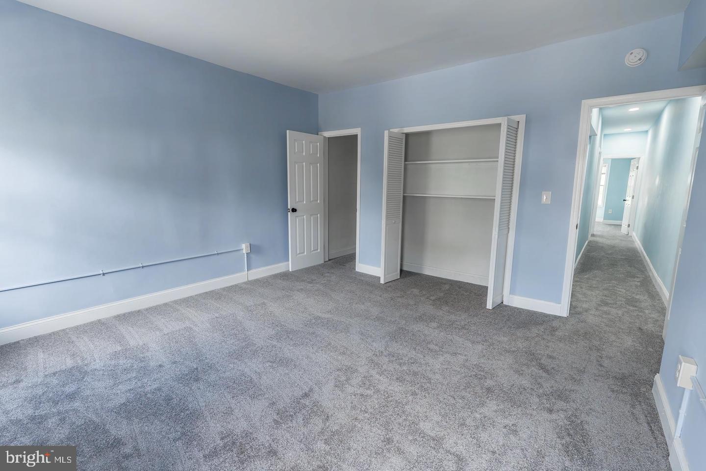 3211 Baker Street Baltimore, MD 21216 - Photo 19 of 20 a view of an empty room and closet area