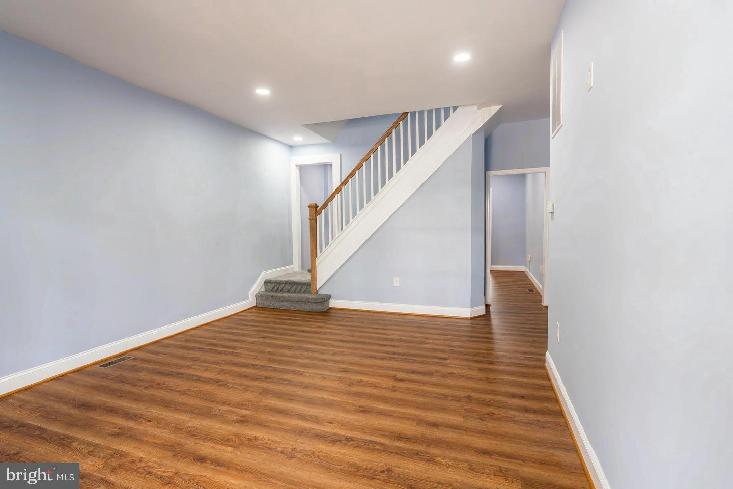 3211 Baker Street Baltimore, MD 21216 - Photo 6 of 20 a view of an entryway with wooden floor