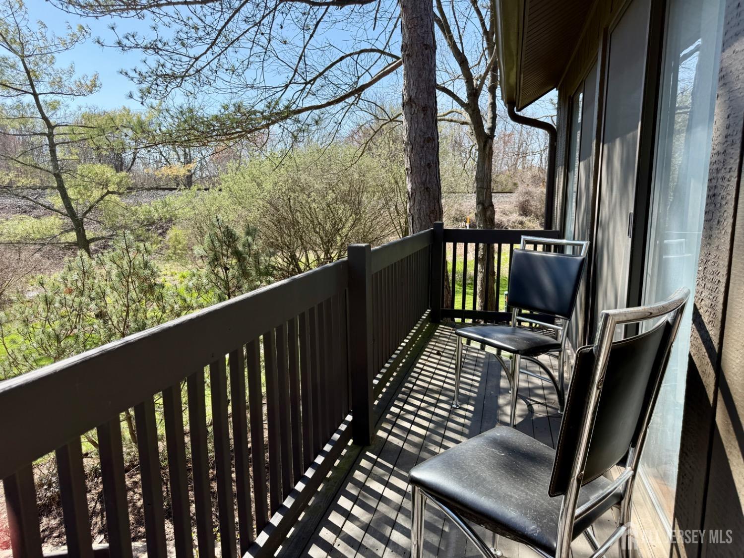 136 Westgate Drive Edison, NJ 08820 - Photo 2 of 17 a view of balcony with wooden floor