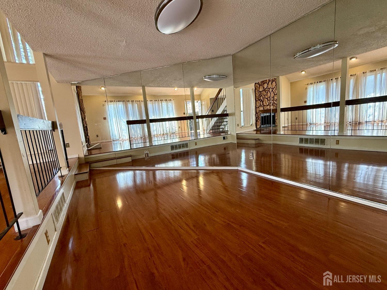 136 Westgate Drive Edison, NJ 08820 - Photo 6 of 17 a view of a living room with hardwood floor