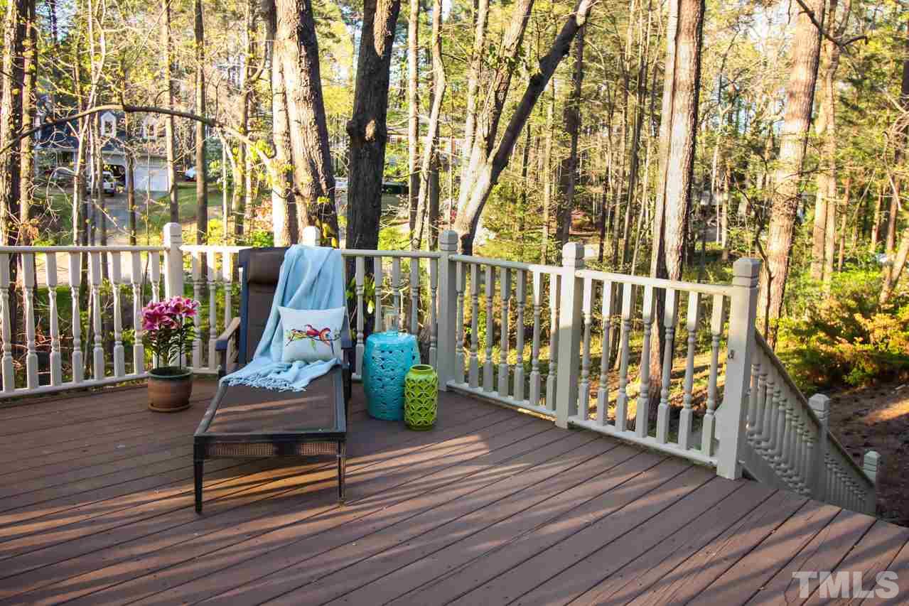 8805 Bickley Place Raleigh, NC 27613 - Photo 22 of 25 a park with bench and wooden fence