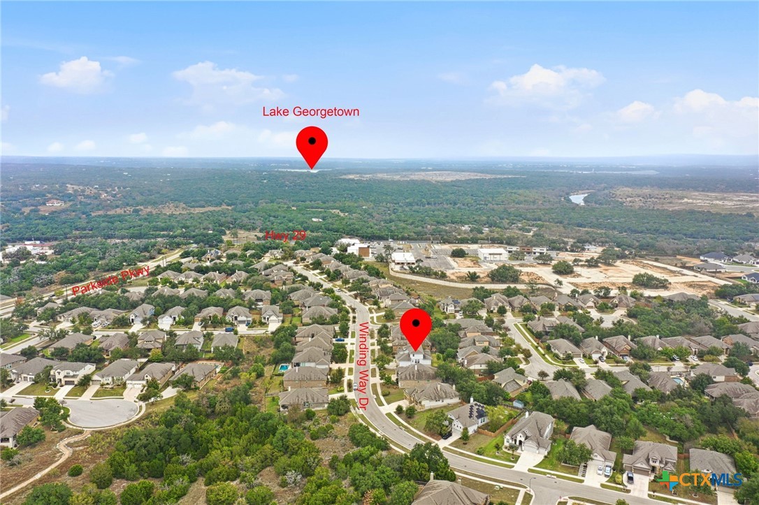 1209 Winding Way Drive Georgetown, TX 78628 - Photo 31 of 37 an aerial view of residential houses with yard