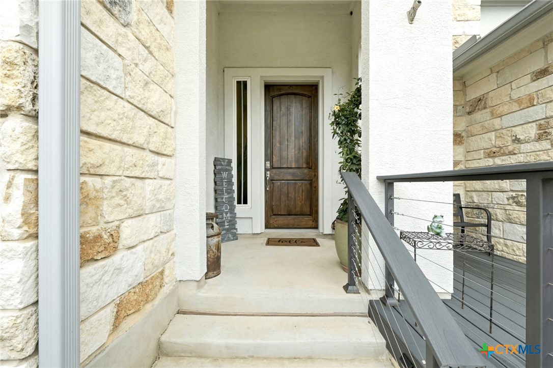 1209 Winding Way Drive Georgetown, TX 78628 - Photo 5 of 37 a view of staircase with large window