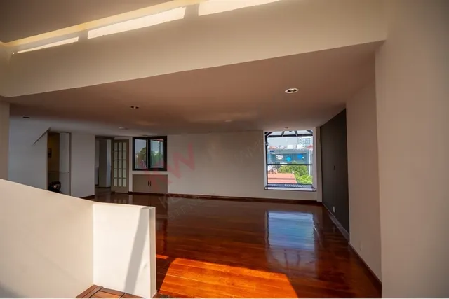 a view of livingroom with hardwood floor and window