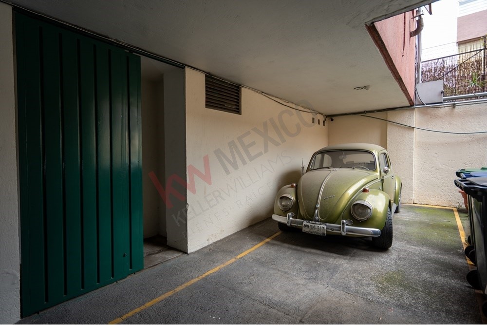 150 Viaducto Rio Becerra, Unit PH Alton Bay, CDMX 03810 - Photo 33 of 33 a car parked in garage