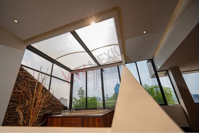 a view of staircase with large window