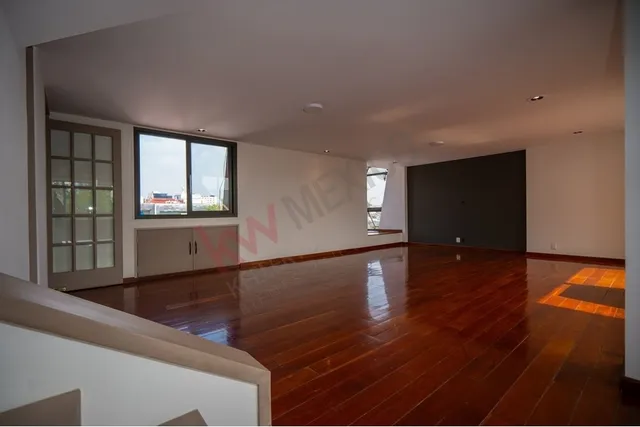a view of a living room hardwood floor
