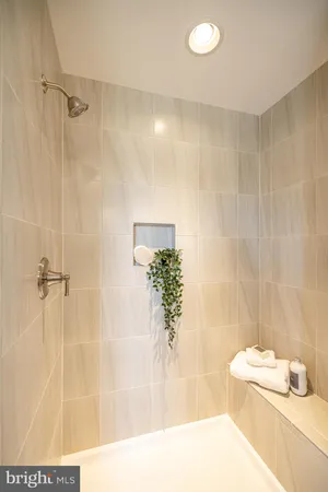 a bathroom with a sink and a shower