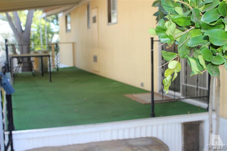 1225 South Rice Road, Unit 35 Ojai, CA 93023 - Photo 11 of 19 a view of a yard with a tree