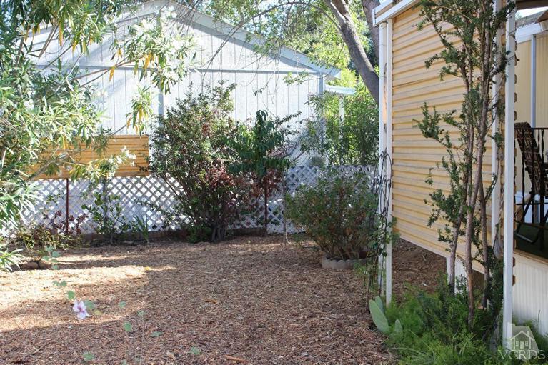 1225 South Rice Road, Unit 35 Ojai, CA 93023 - Photo 4 of 19 a view of a yard with a tree
