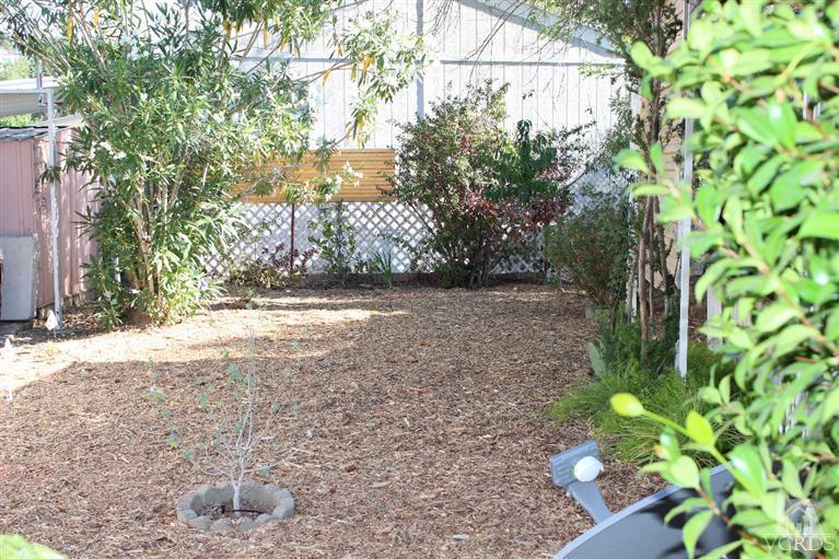 1225 South Rice Road, Unit 35 Ojai, CA 93023 - Photo 6 of 19 a backyard of a house with lots of green space