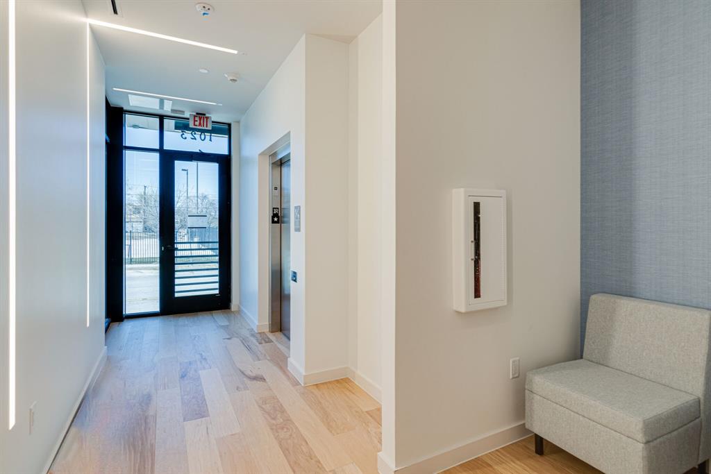 1023 Lipscomb Street, Unit 302 Fort Worth, TX 76104 - Photo 4 of 30 a view of a hallway with interior of the house