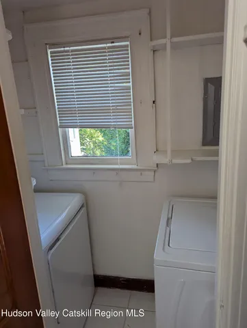 a view of balcony with wooden floor