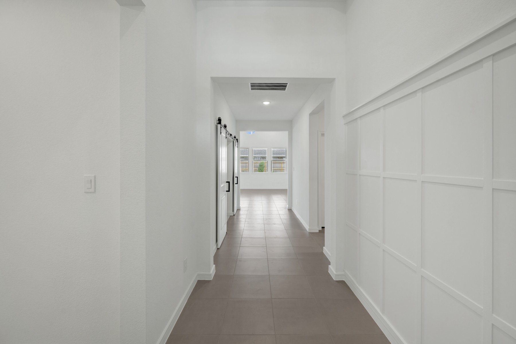 3214 Rios Court League City, TX 77573 - Photo 2 of 48 Inviting foyer with decorative feature wall