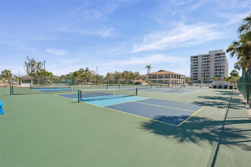 6415 Midnight Pass Road, Unit 211 Sarasota, FL 34242 - Photo 46 of 58 a view of a tennis court