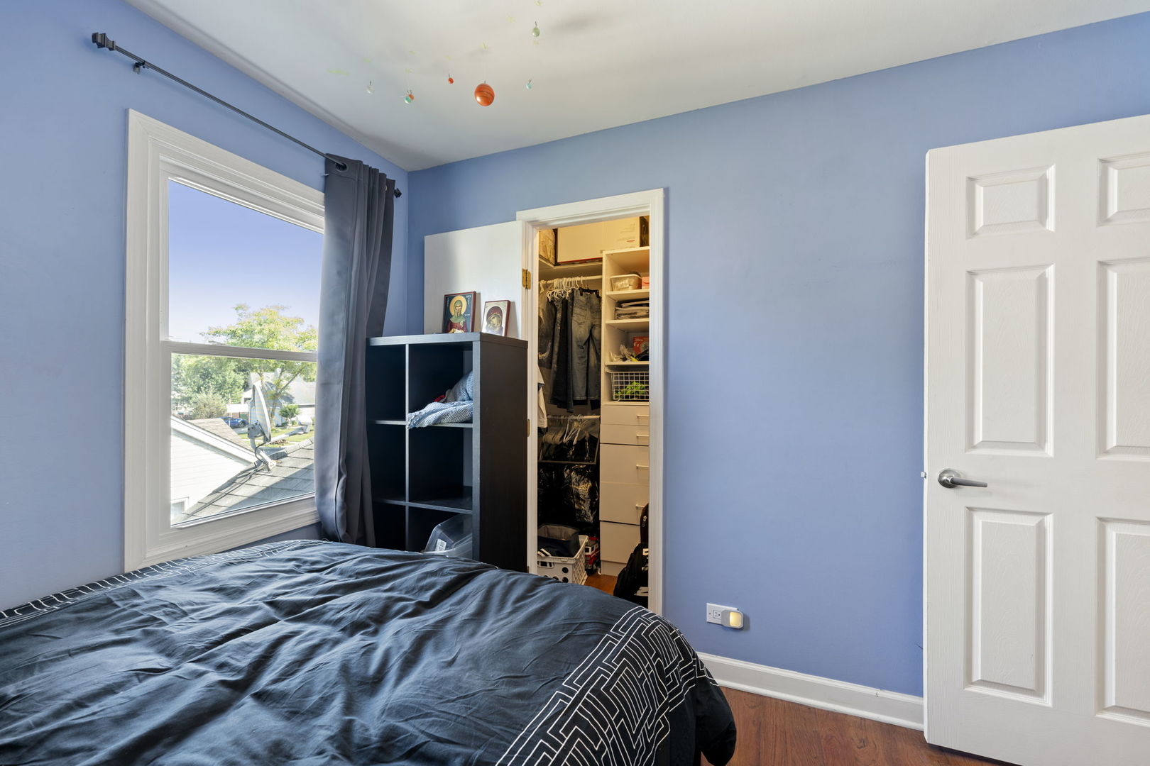 24 Fillmore Lane Streamwood, IL 60107 - Photo 21 of 35 a bedroom with a bed and a window