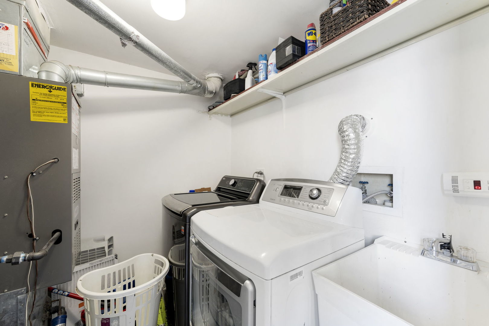 24 Fillmore Lane Streamwood, IL 60107 - Photo 24 of 35 a utility room with dryer and washer